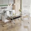 Dining table. Modern tempered glass dining table. Large modern office desk with silver plated metal legs and MDF crossbars, suitable for both home and