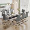 Dining table. Modern tempered glass dining table. Large modern office desk with silver plated metal legs and MDF crossbars, suitable for both home and